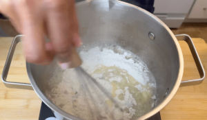 add flour to butter