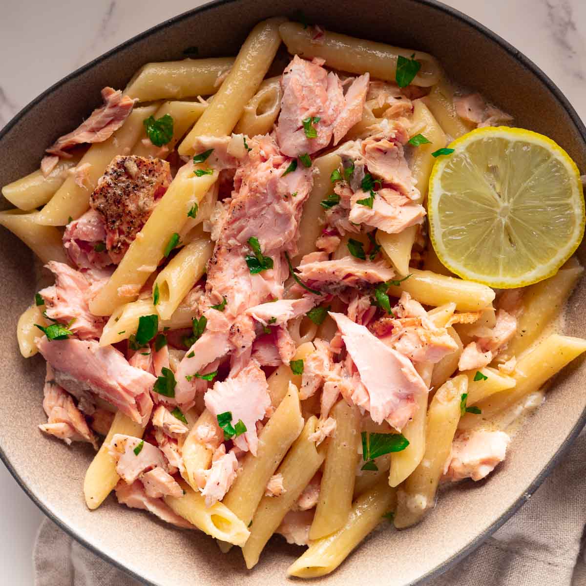 Creamy pasta alla Salmone topped with fresh parsley.
