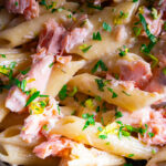 Creamy pasta alla Salmone pasta topped with fresh parsley.