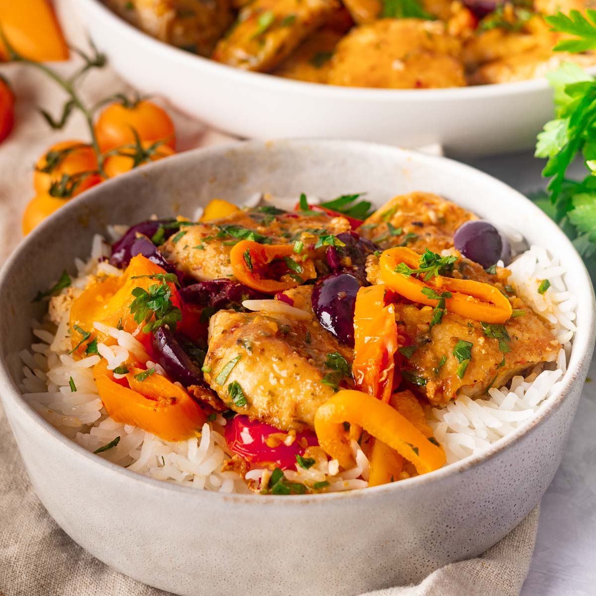 chicken peppers, tomatoes, rice and olives