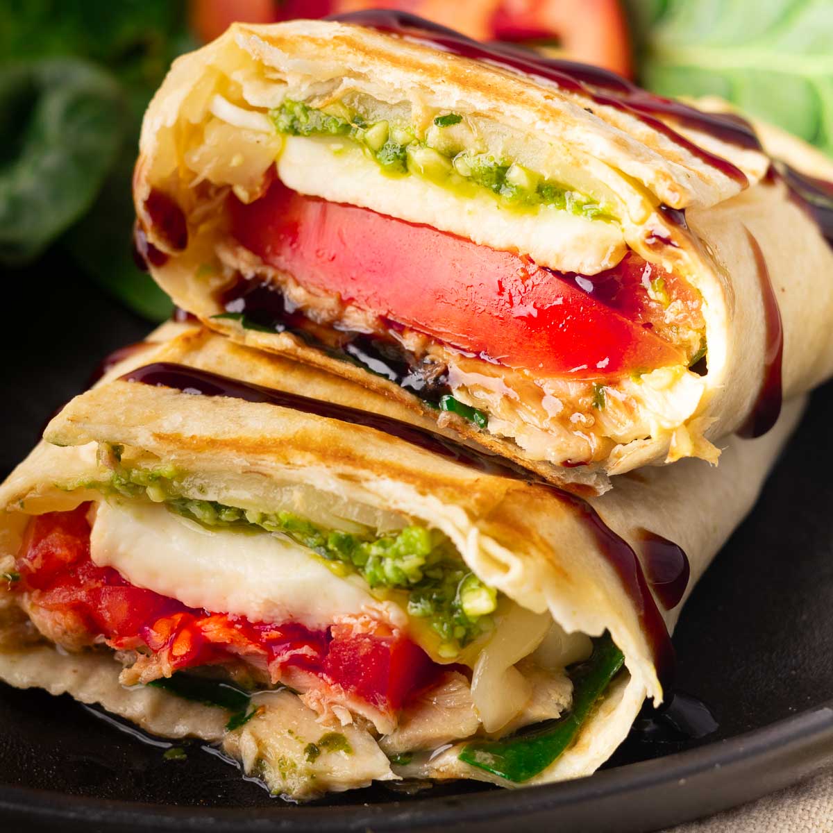 tuna melt with cheese, pesto and balsamic vinegar in a wrap