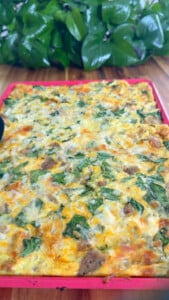 Baked egg with spinach and cheese.