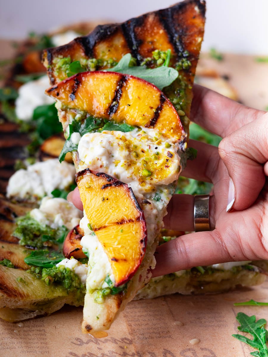 Peach burrata flatbread slice.