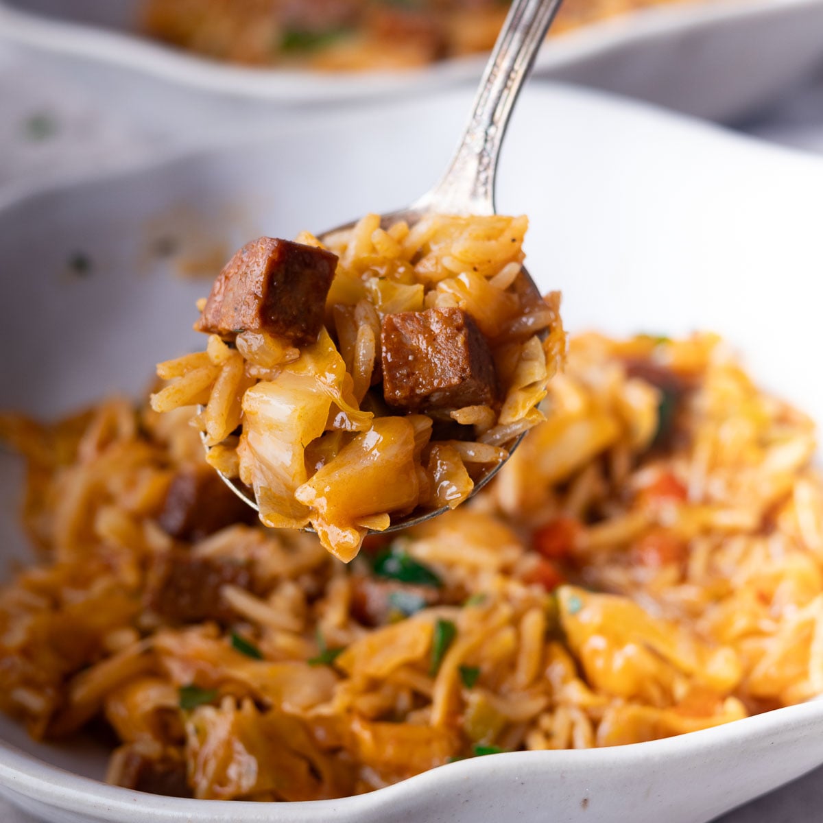 Close-up of a spoonful of Mediterranean Dirty Cabbage.