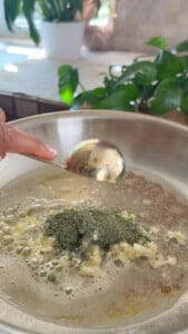 Melting butter with seasonings and garlic